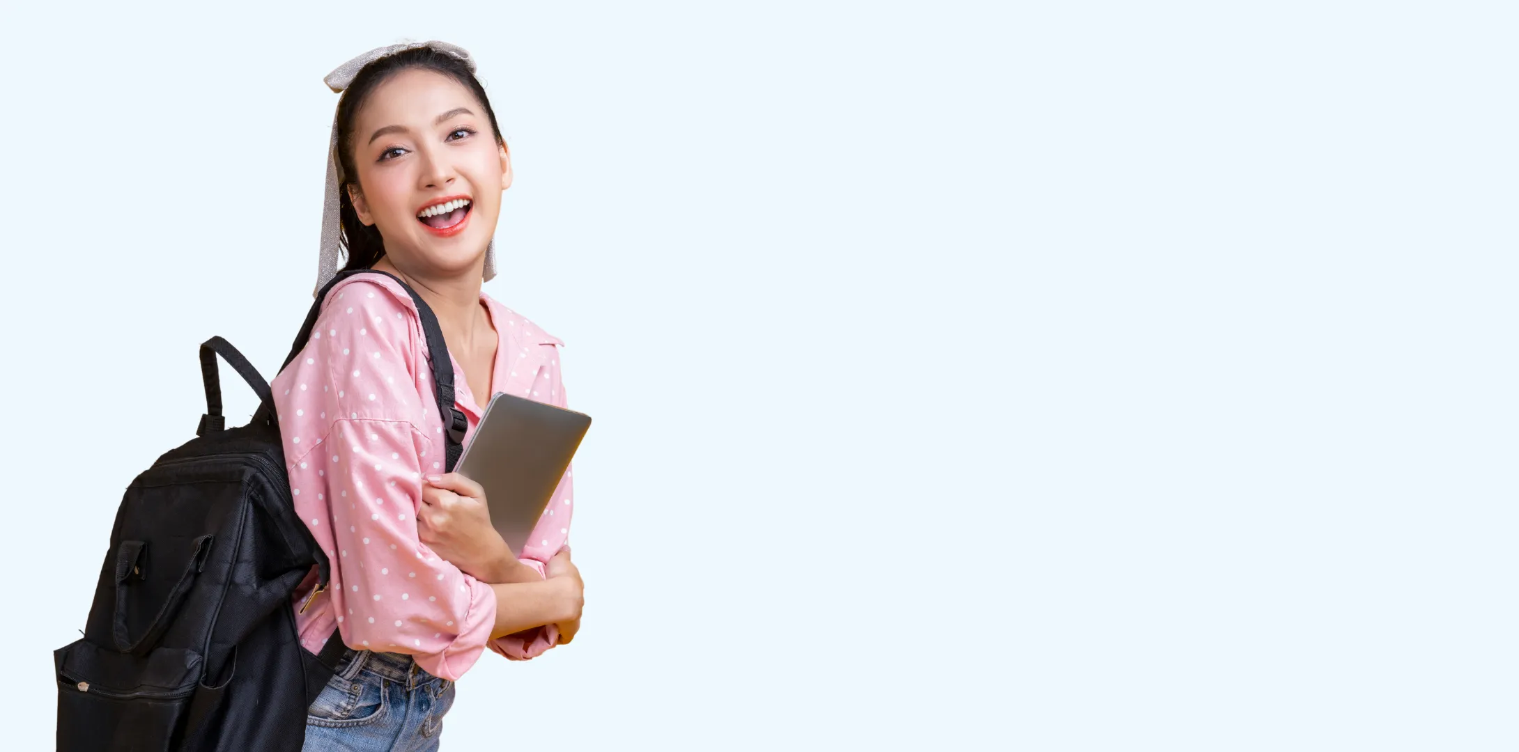 A learner standing and facing toward the camera